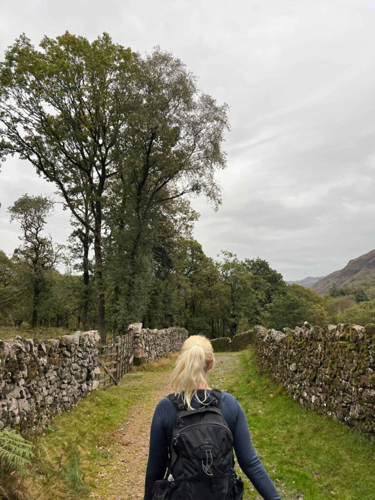 A woman walking on a stone track