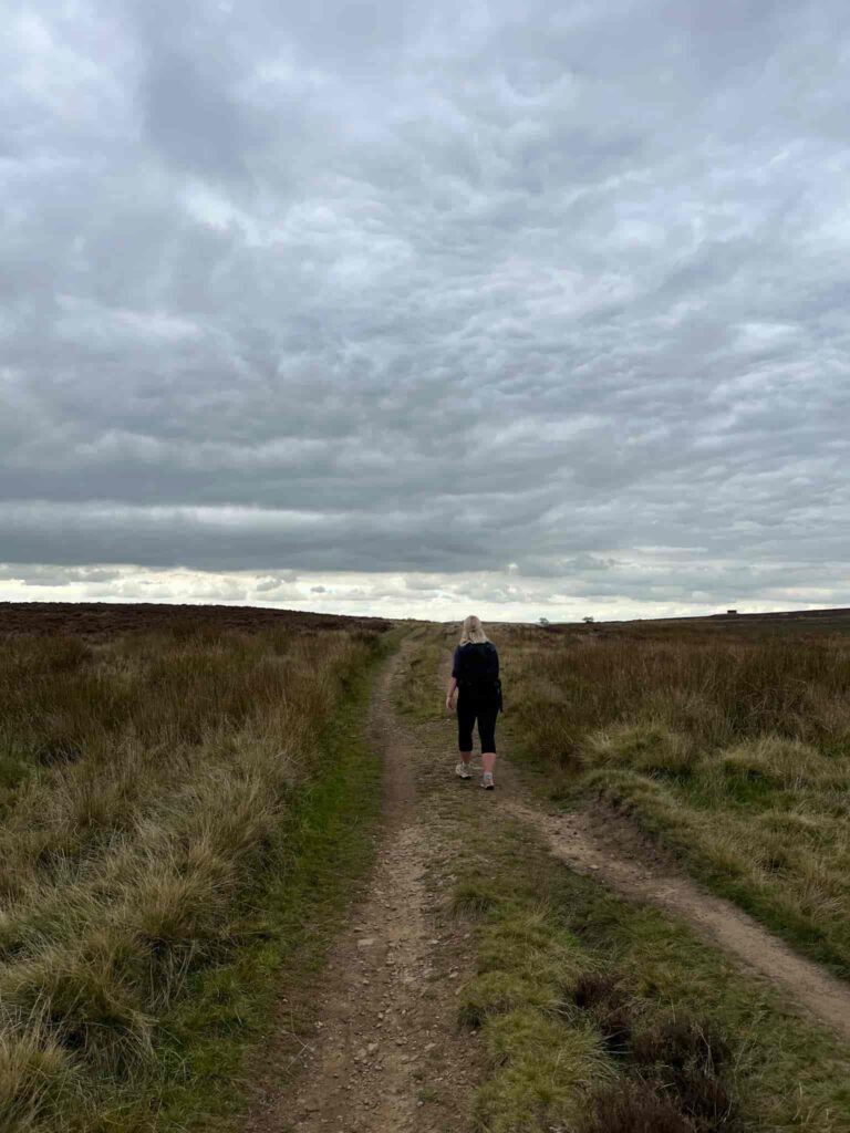 A woman walking on the moors