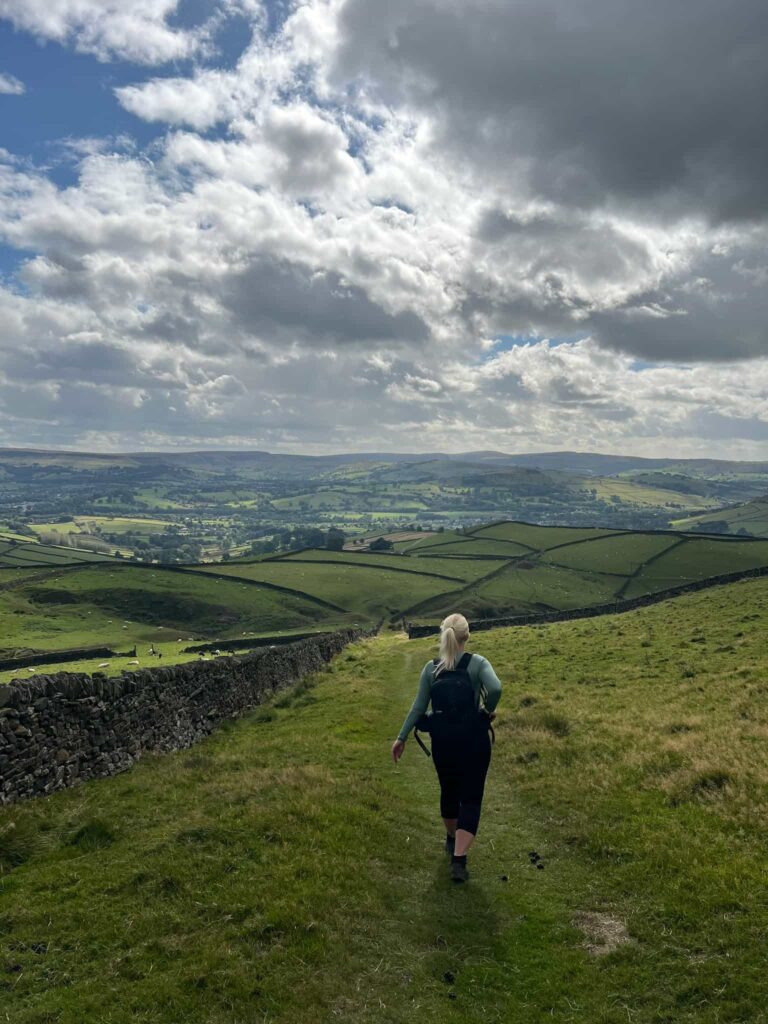 A woman walking in a field
