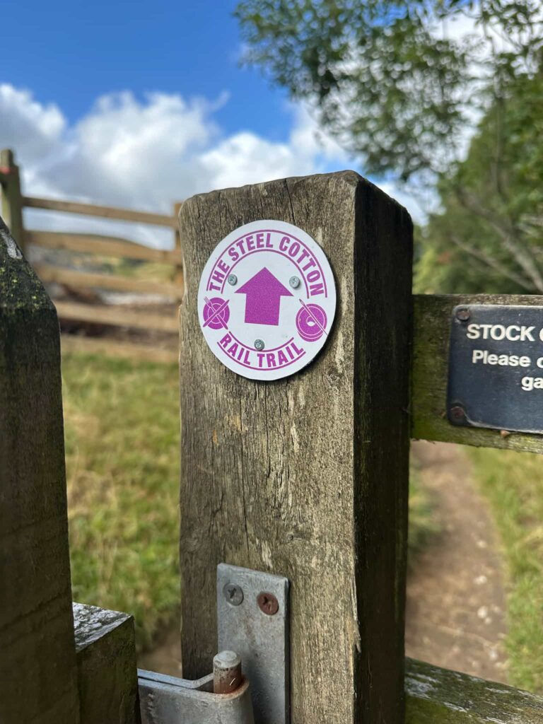 Steel Cotton Rail Trail marker