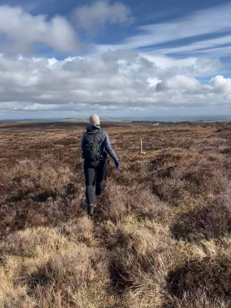 A woman walking on the Thornseat Moors