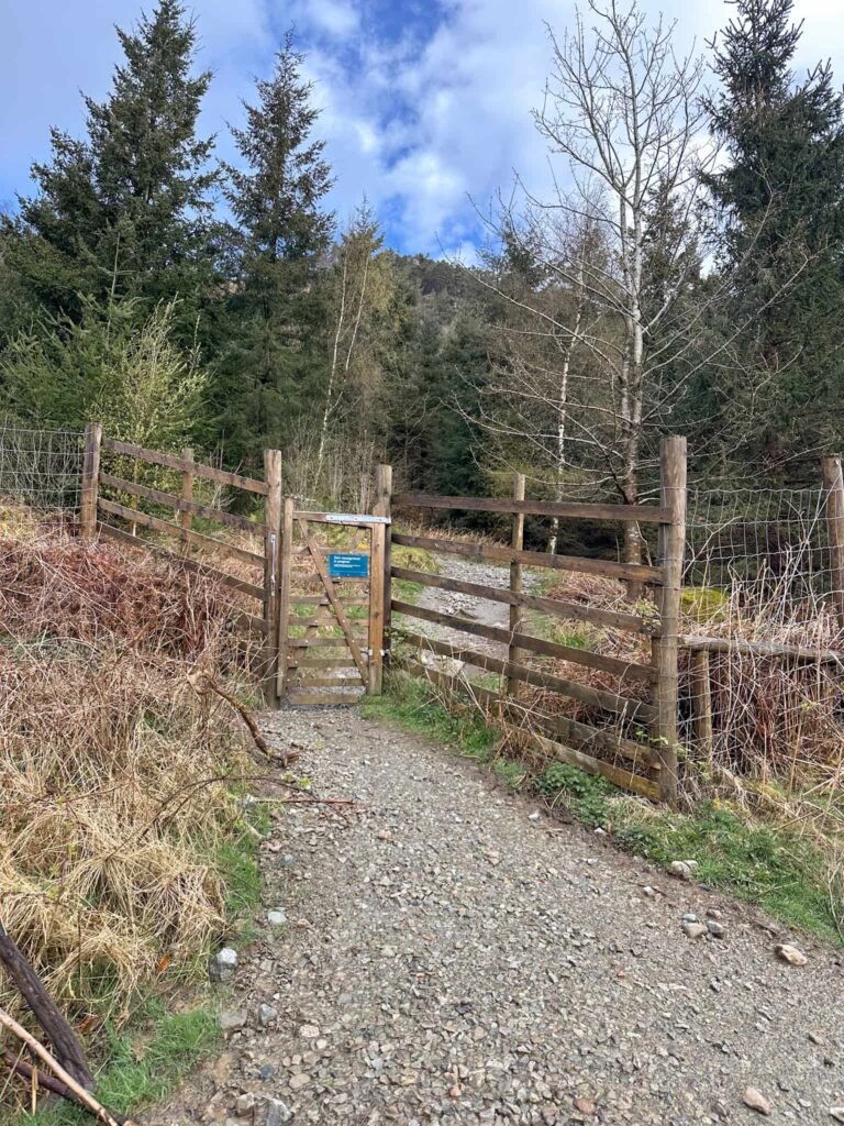 A large wooden gate leading to Raven Crag