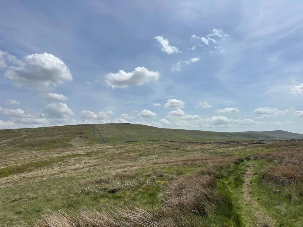 Moorland views with a cloudy but blue sky