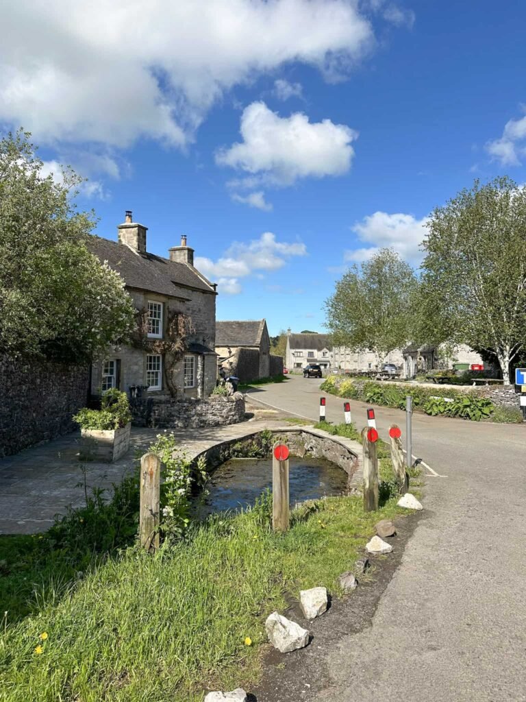 A small bridge and cottages in Hartington village centre