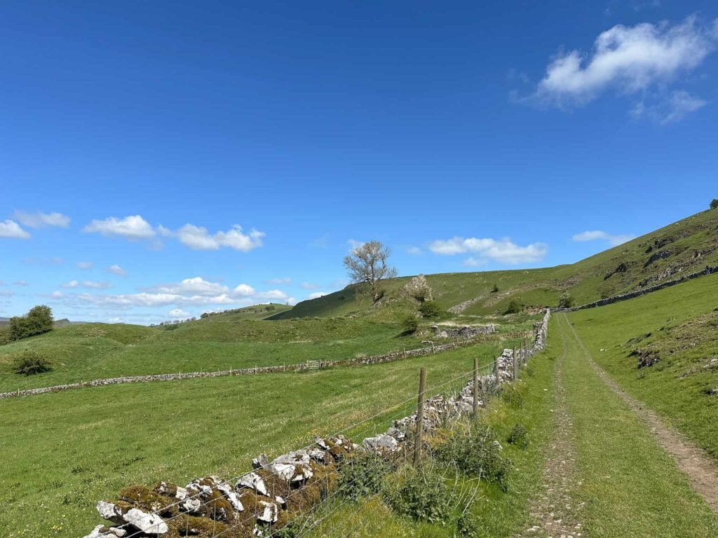 Looking over to Pilsbury Castle, all that remains is the earthworks which look like small hills