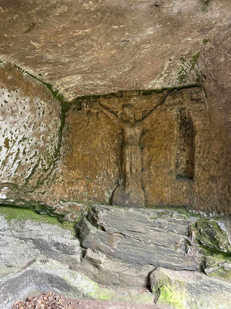 Carving inside the Hermit's Cave at Cratcliffe Rocks