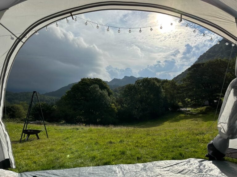 Views of mountains from inside a tent
