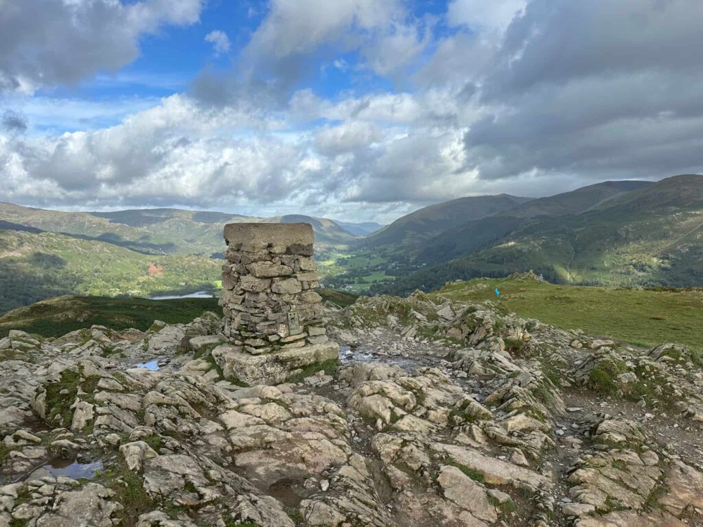 Loughrigg Fell trig point, a stone monument.