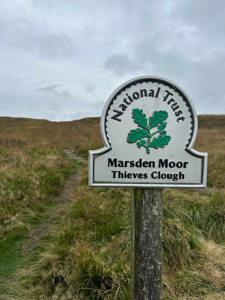 A sign for Thieves Clough