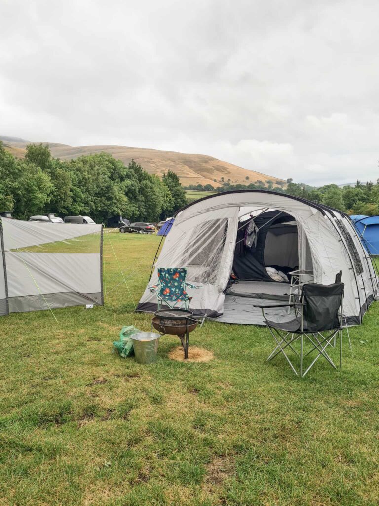 Grey tent with grey windbreak